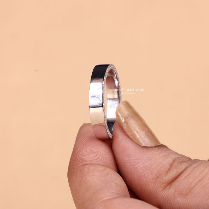 Side view of round diamond wedding band