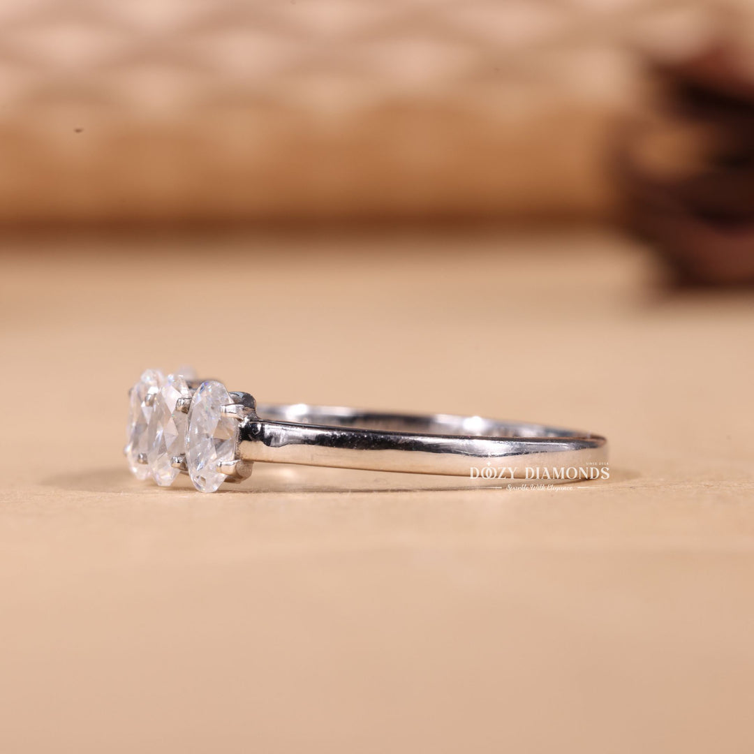 Oval diamond band stacked with engagement ring