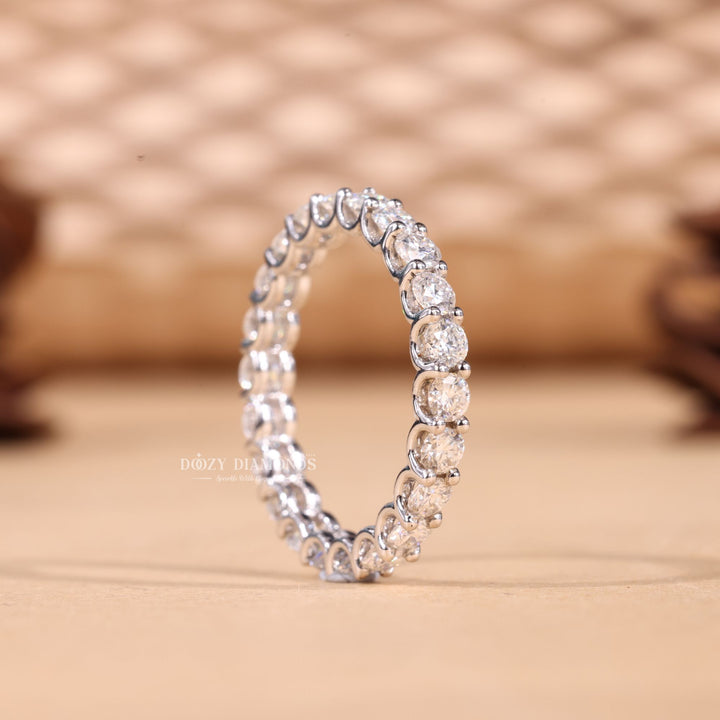 Round diamond band stacked with engagement ring