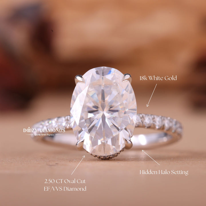 Macro shot of oval cut diamond facets in hidden halo ring setting