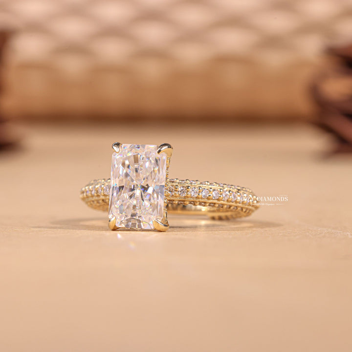 Radiant pave diamond ring displayed on jewelry stand