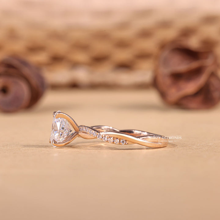Oval solitaire engagement ring shown on hand for true-to-life sizing