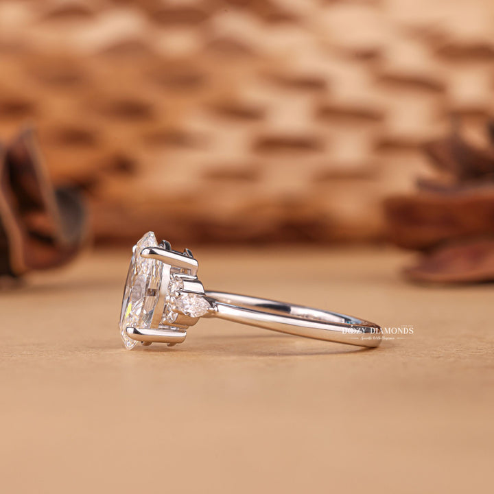 Certified oval cut diamond featured in cluster engagement ring