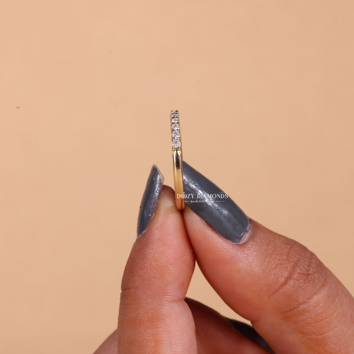 Round lab grown diamond band worn on hand