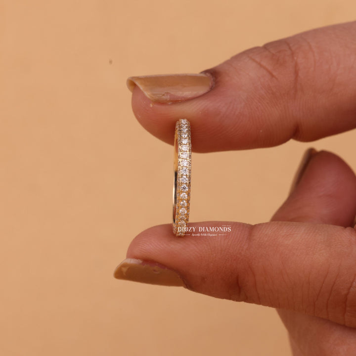 Round diamond wedding band in rose gold