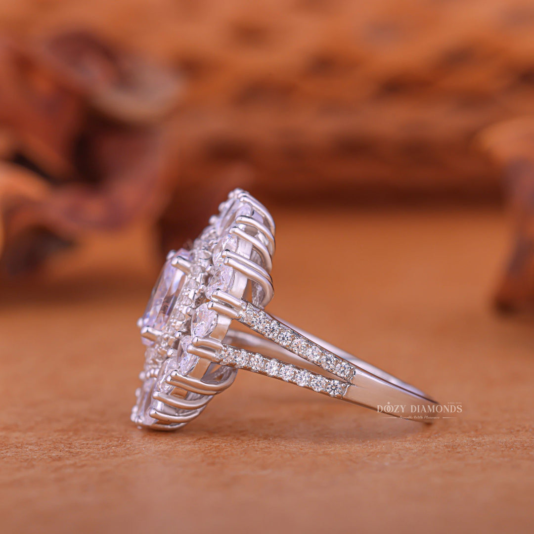 Angled view of oval cut diamond in cluster setting