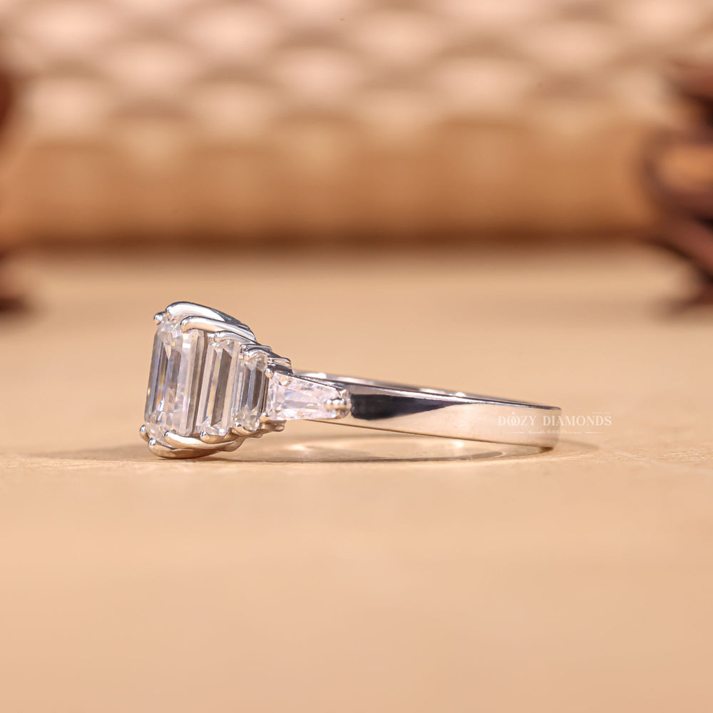 Emerald cut cluster engagement ring with IGI certified center diamond