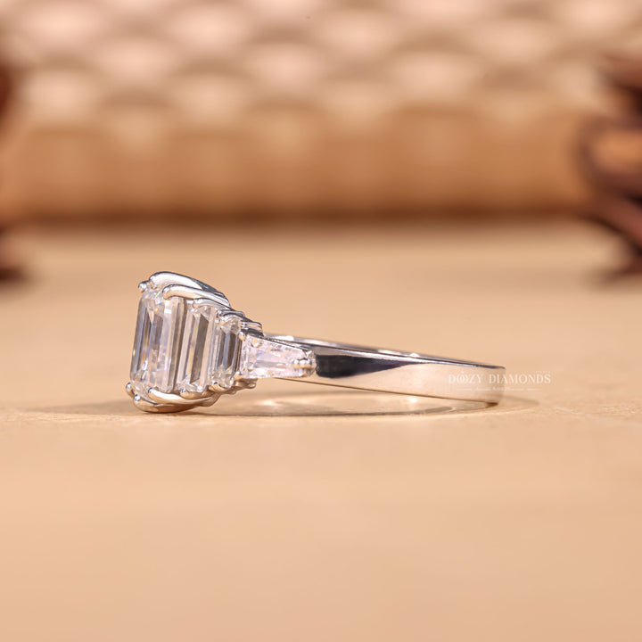 Emerald cut cluster engagement ring with IGI certified center diamond