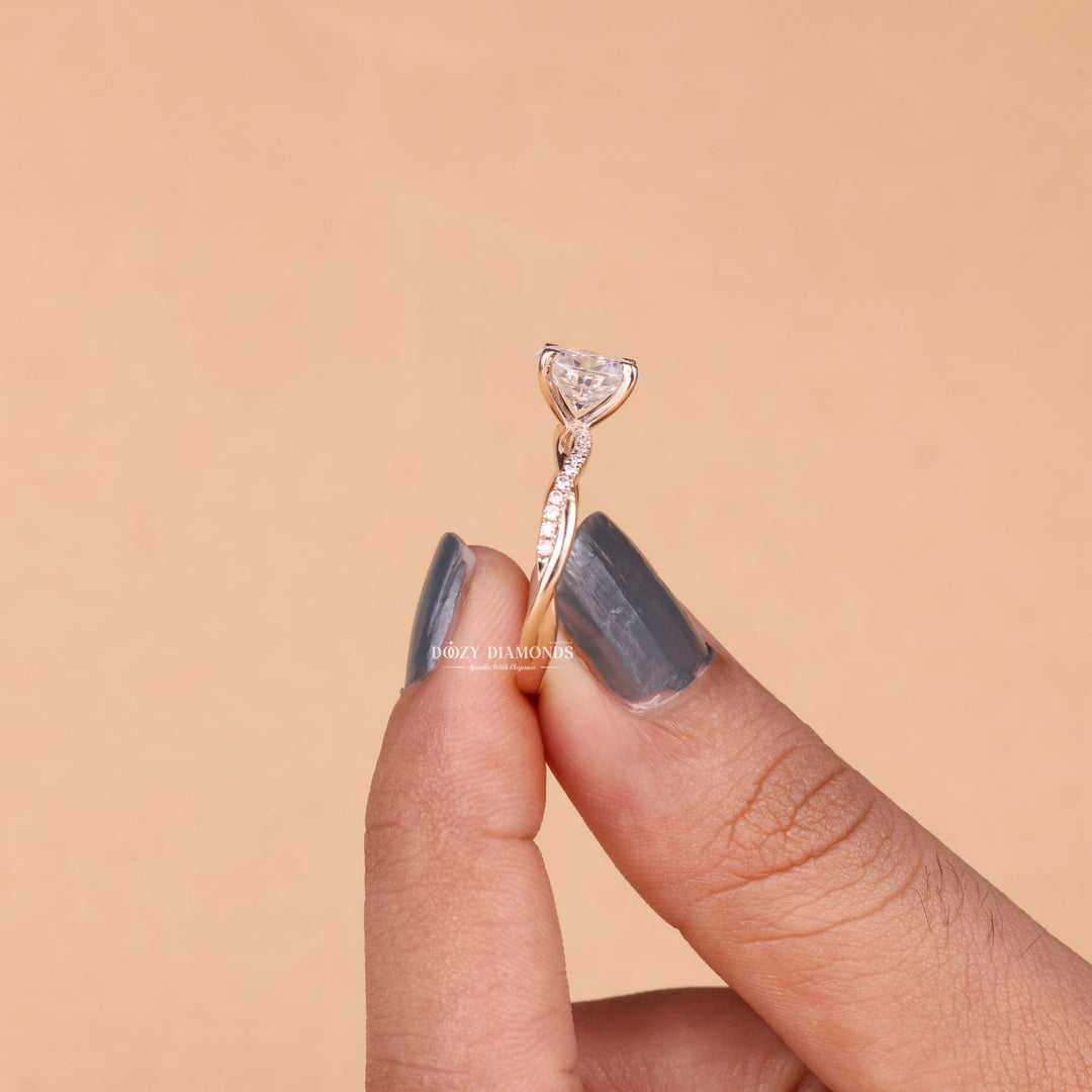 Oval cut solitaire engagement ring with IGI certified center diamond