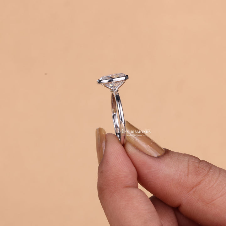Handcrafted oval cut bezel lab grown diamond engagement ring