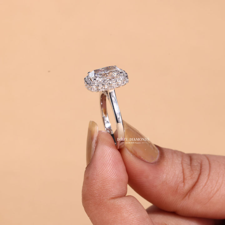 Cushion cut engagement ring side view showing band detail