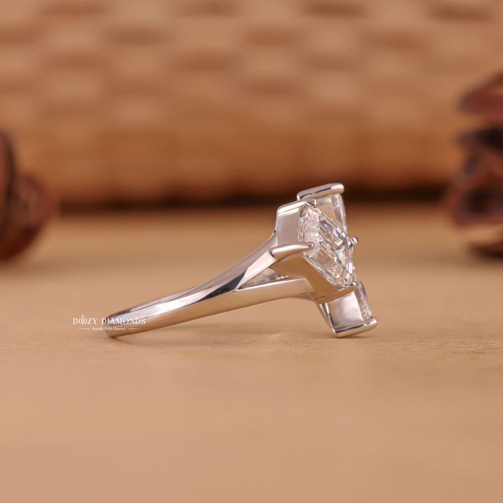 Marquise three stone engagement ring close-up highlighting diamond sparkle