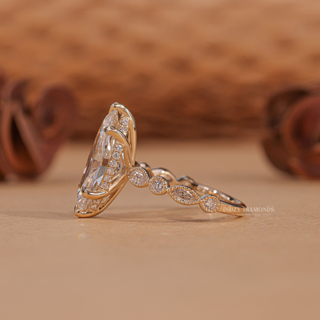 Close-up of marquise cut center diamond in vintage engagement ring