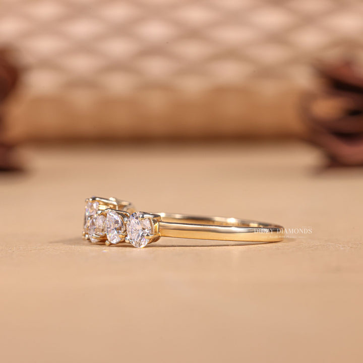 Oval & Pear diamond band stacked with engagement ring