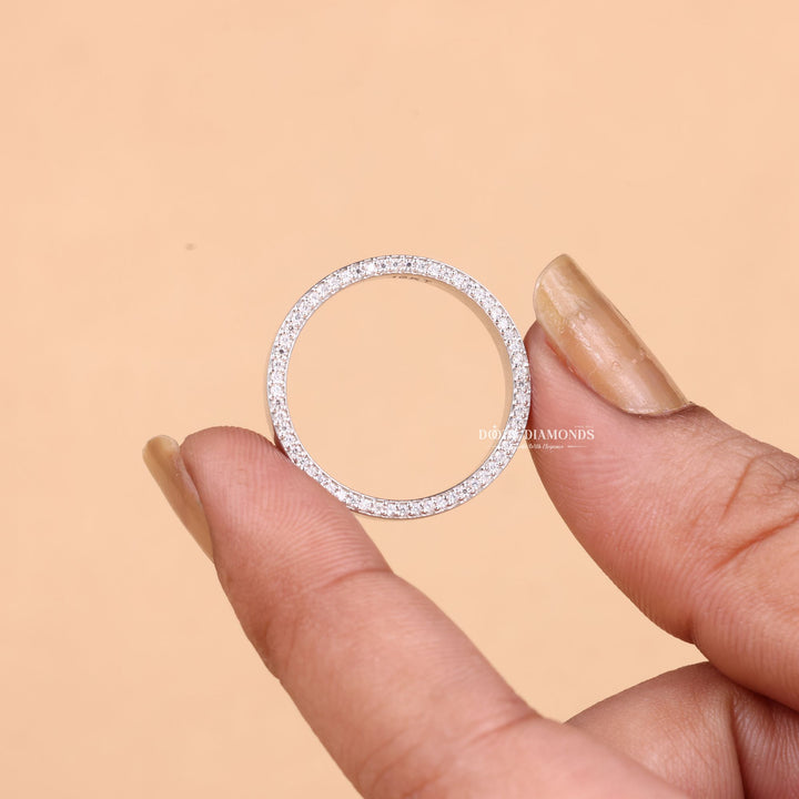 Round lab grown diamond band worn on hand