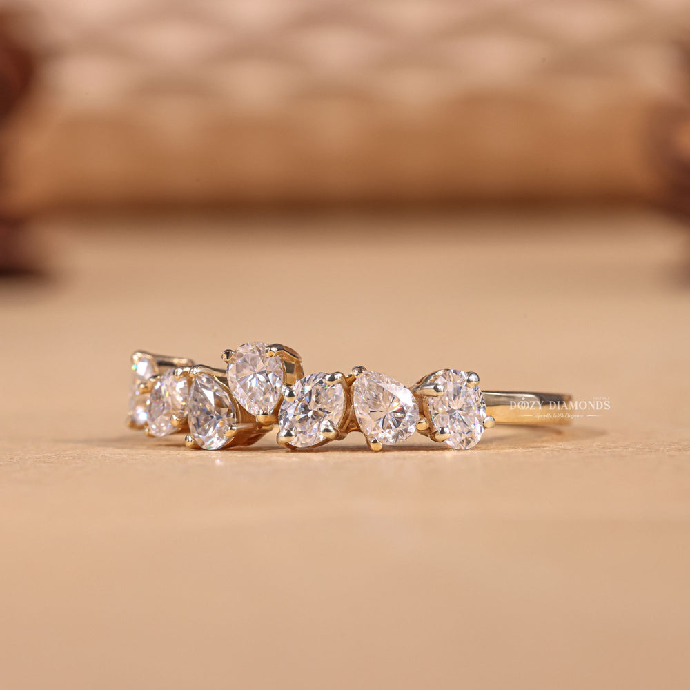 Close-up of 0.80CT oval & pear lab grown diamonds