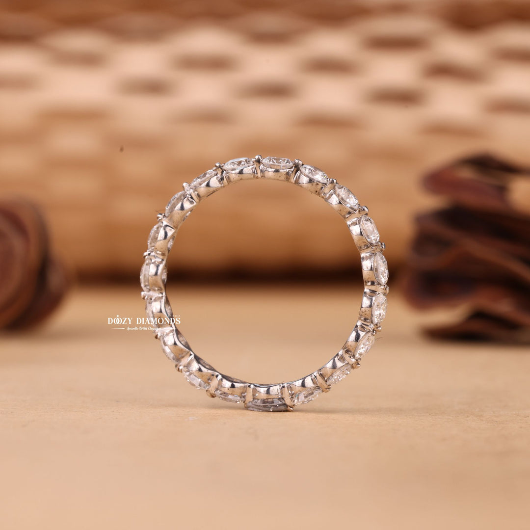 Round diamond band stacked with engagement ring