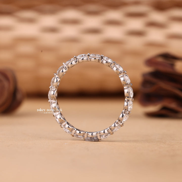 Round diamond band stacked with engagement ring
