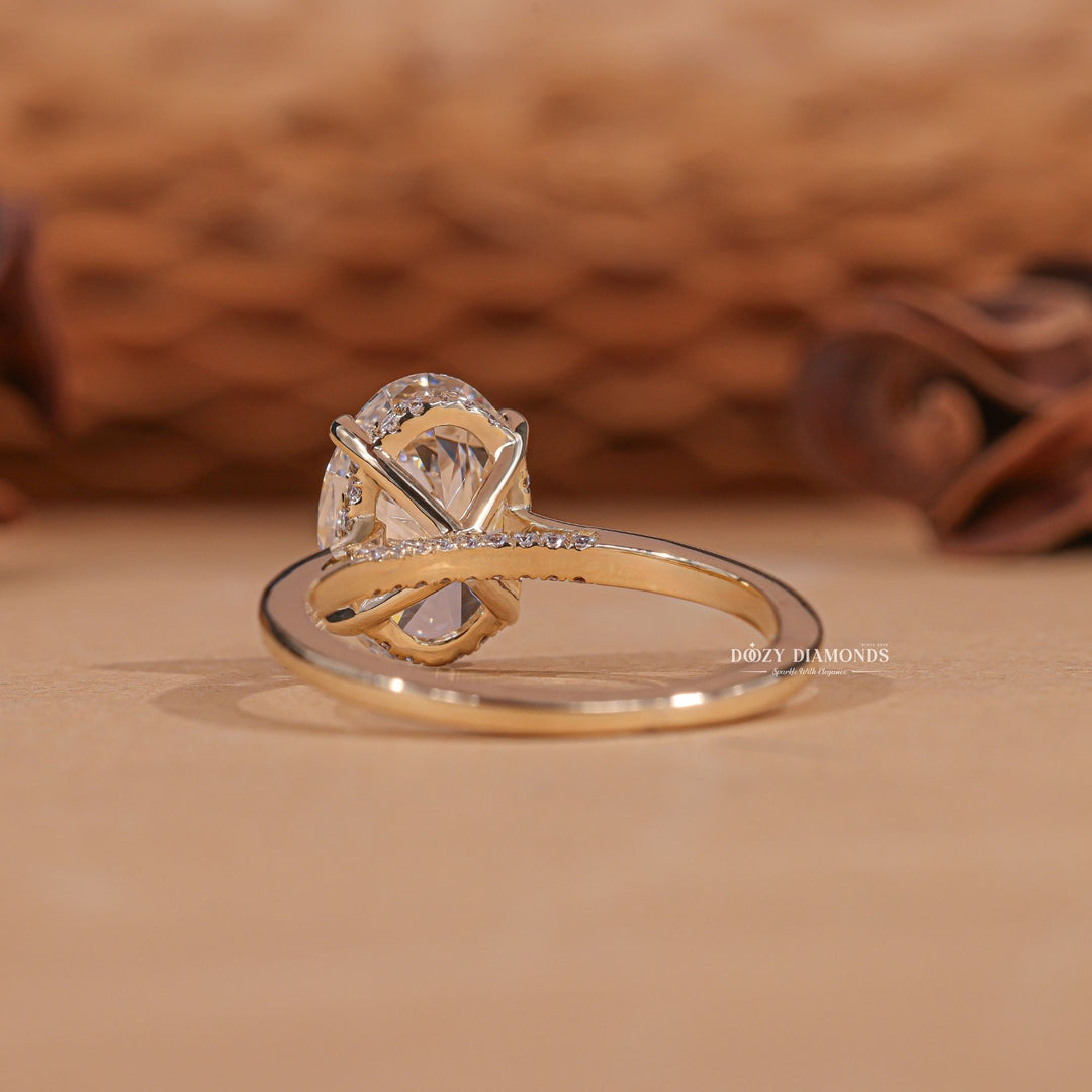 Oval hidden halo lab grown diamond ring side profile in gold setting