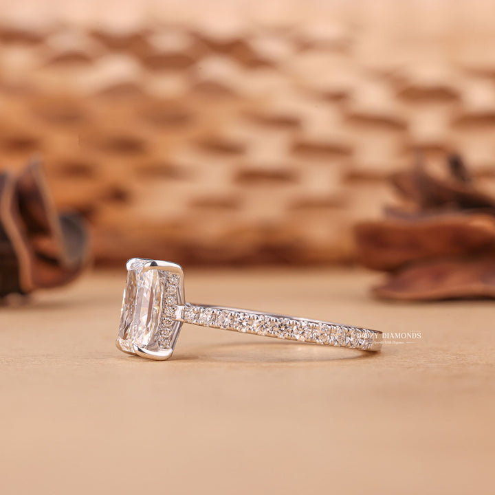 Side angle of radiant hidden halo diamond engagement ring