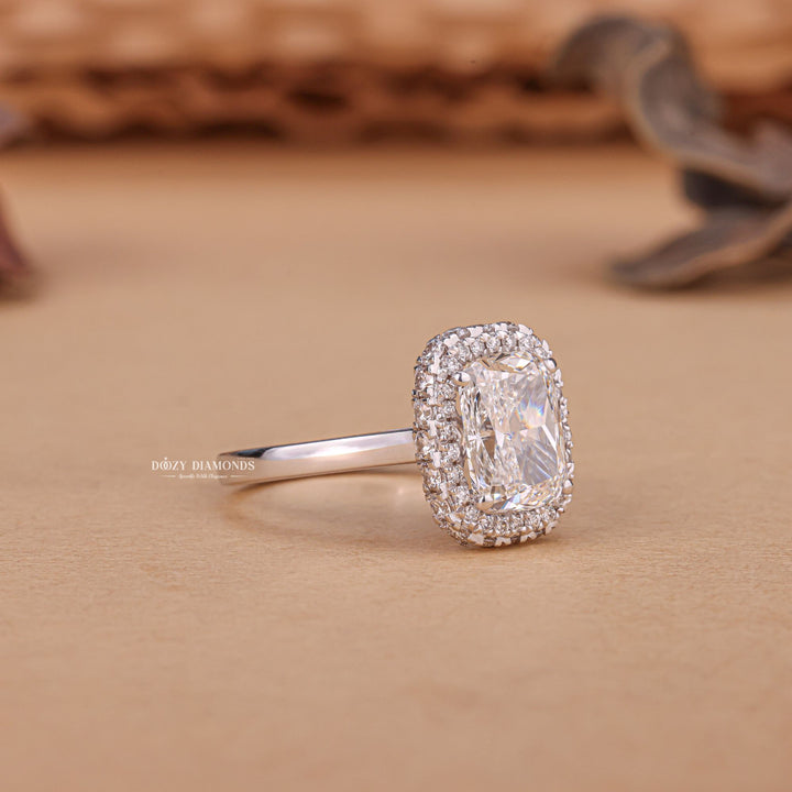 Cushion halo engagement ring close-up highlighting diamond sparkle
