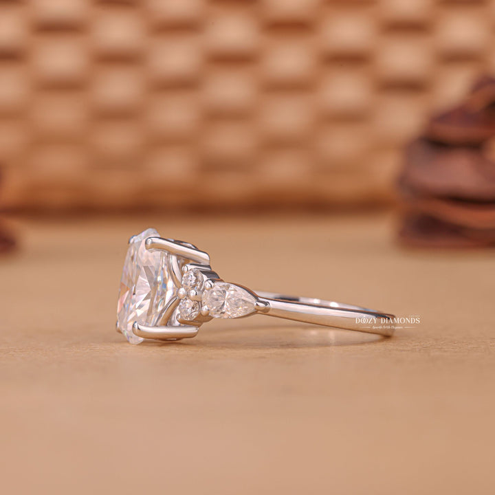 Oval cut diamond ring worn on hand