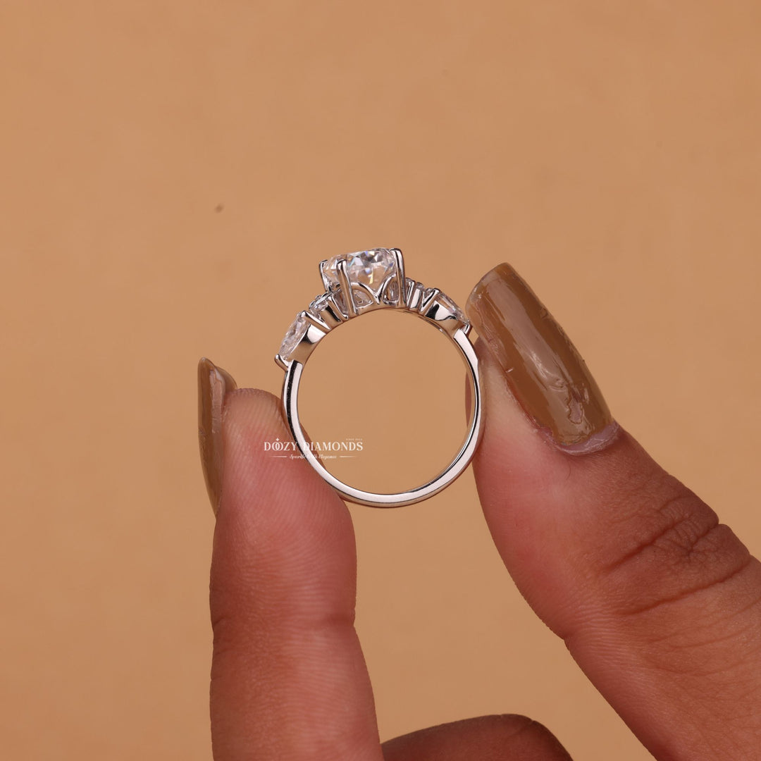 IGI certified oval cut diamond in cluster engagement ring setting