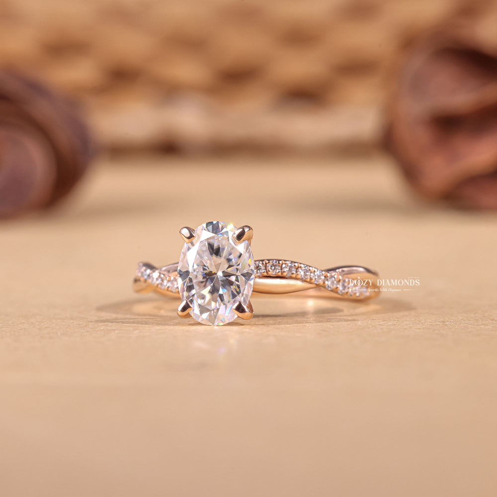 Oval solitaire engagement ring viewed from the side