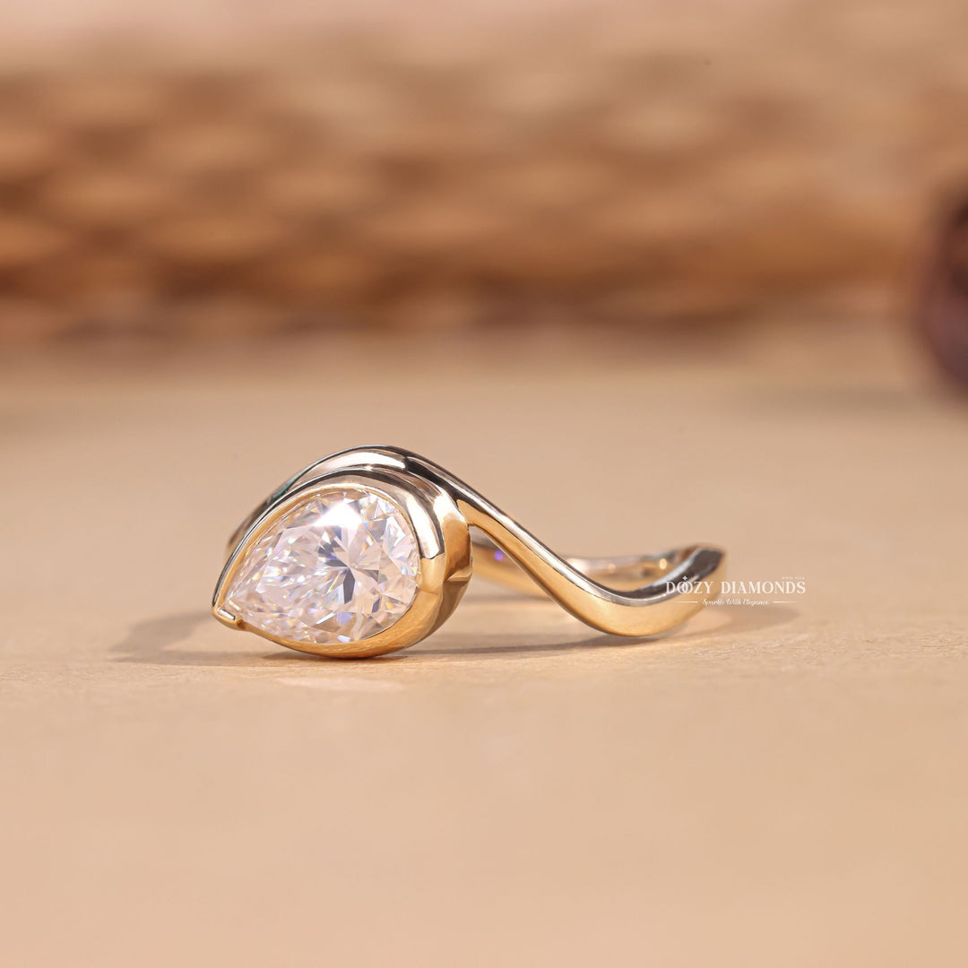 Handcrafted marquise cut bezel lab grown diamond engagement ring
