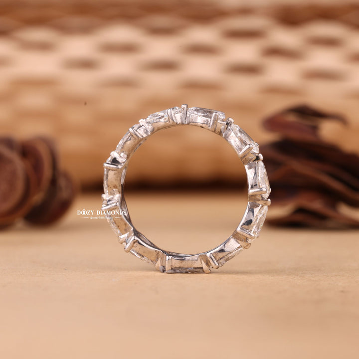 Ethically sourced pear diamond eternity band