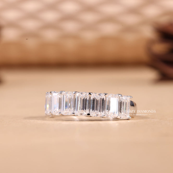 Emerald diamond band stacked with engagement ring