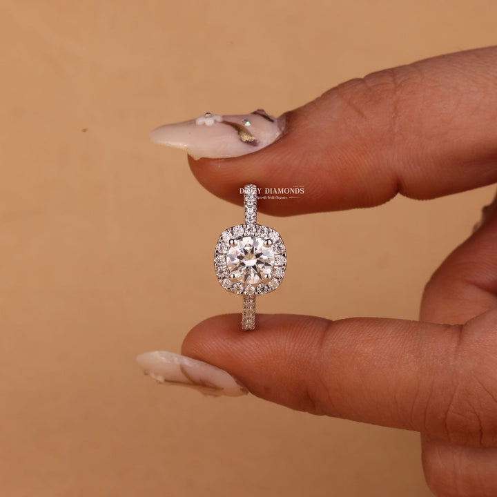 Profile view of round cut halo engagement ring band
