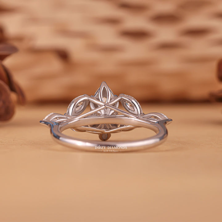Unboxing view of marquise cut cluster diamond engagement ring
