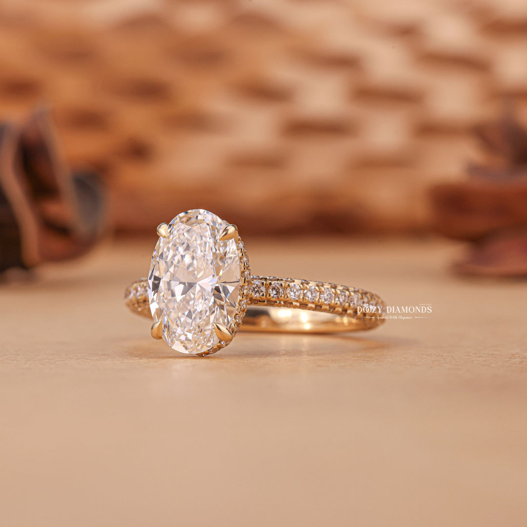 Certified oval cut diamond featured in hidden halo engagement ring