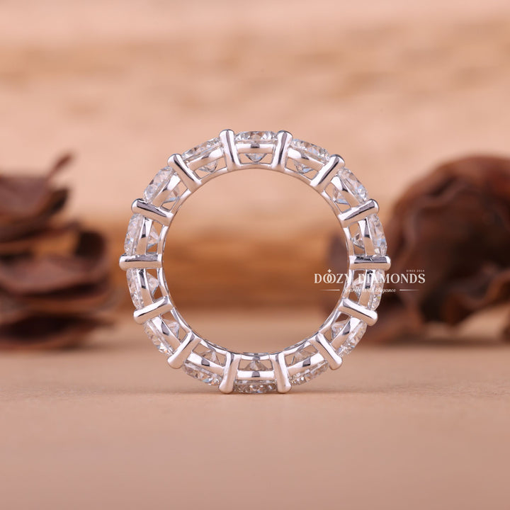 Round diamond band stacked with engagement ring
