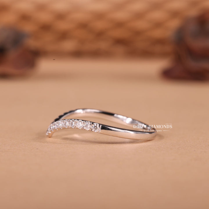 Round diamond band stacked with engagement ring