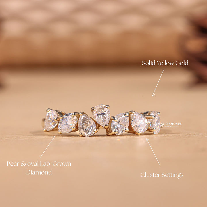 Oval & Pear diamond wedding band in yellow gold