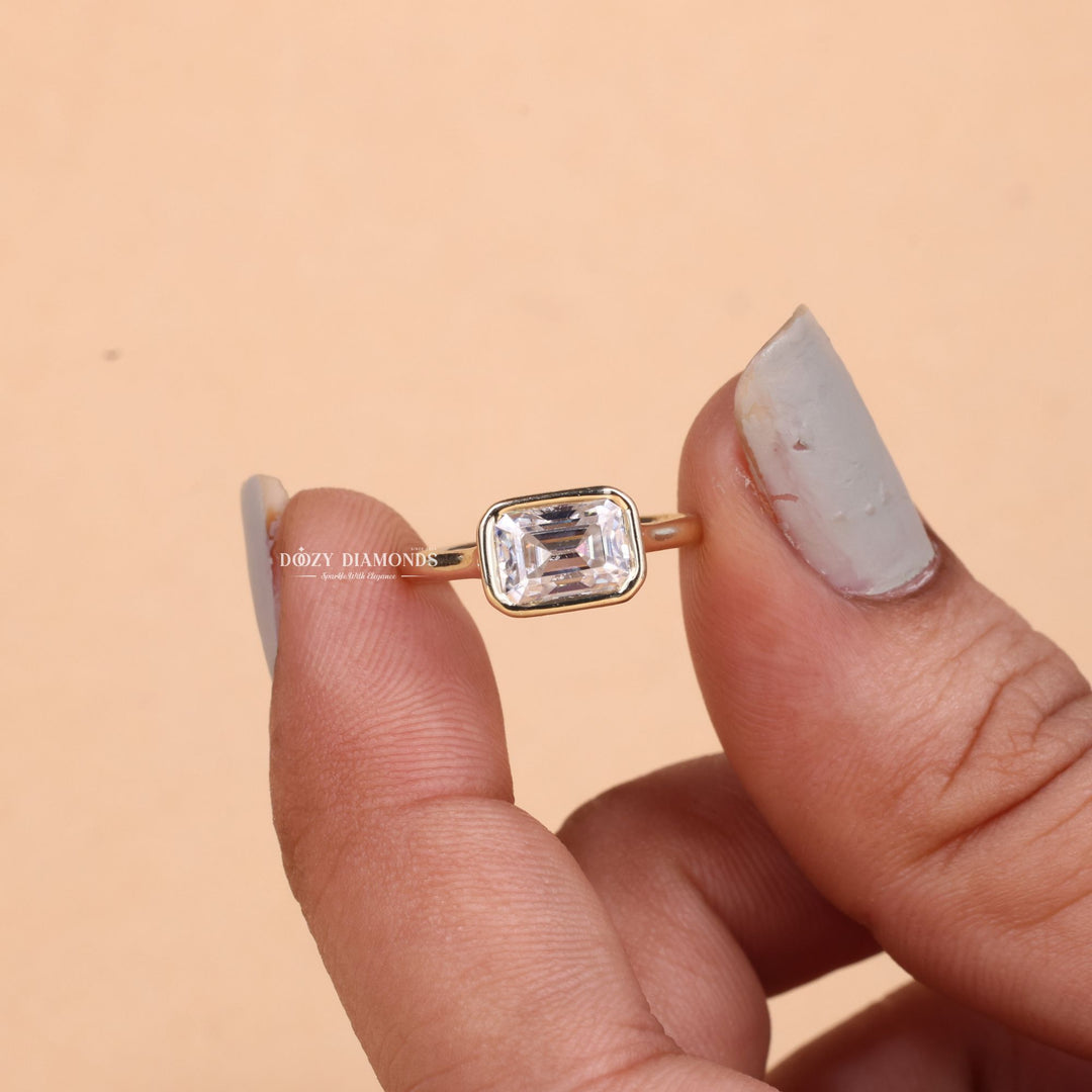 Emerald bezel lab grown diamond ring fitted on finger