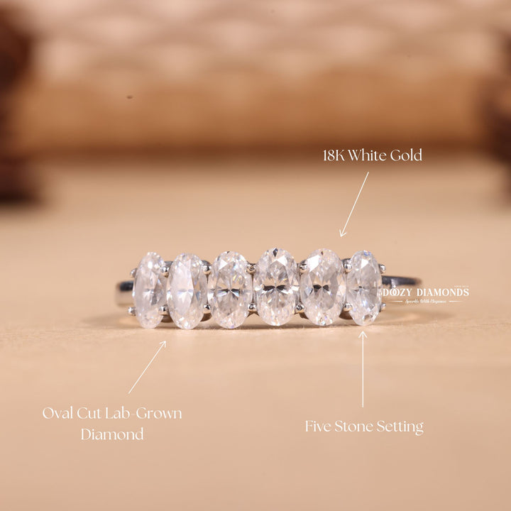 Oval diamond wedding band in yellow gold