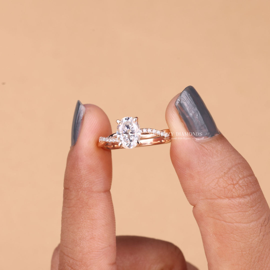 Oval cut solitaire engagement ring shown in real-life wear