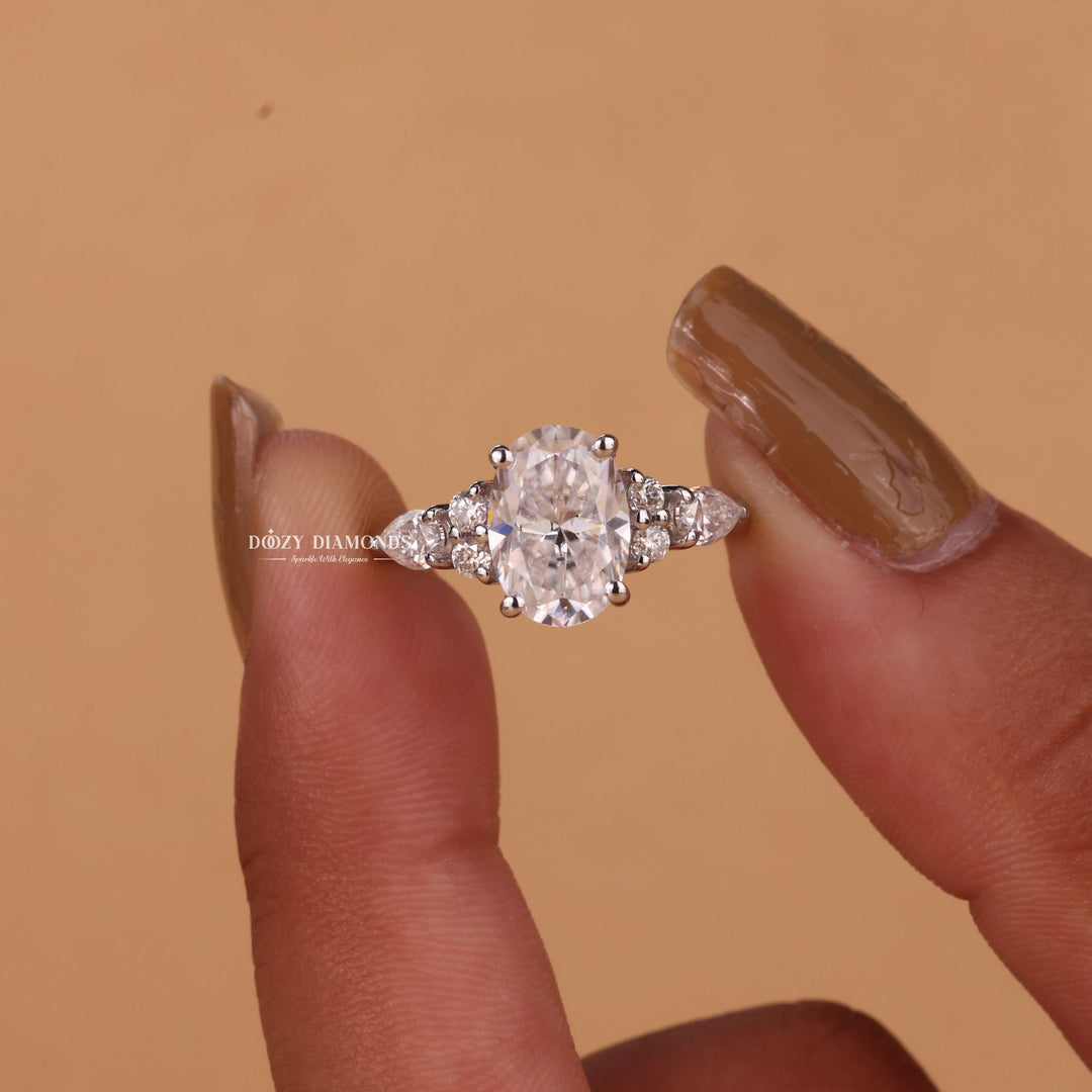 Oval cluster engagement ring with certified lab grown diamond