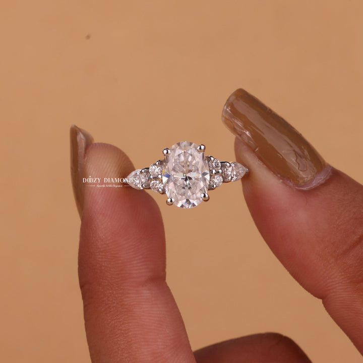 Oval cluster engagement ring with certified lab grown diamond