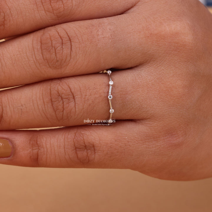Round diamond wedding band in rose gold