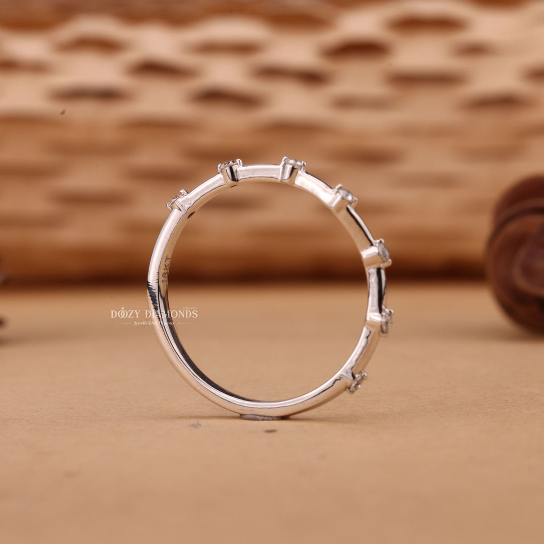 Round diamond band stacked with engagement ring