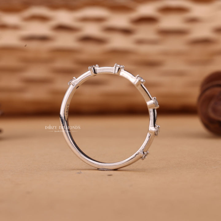 Round diamond band stacked with engagement ring