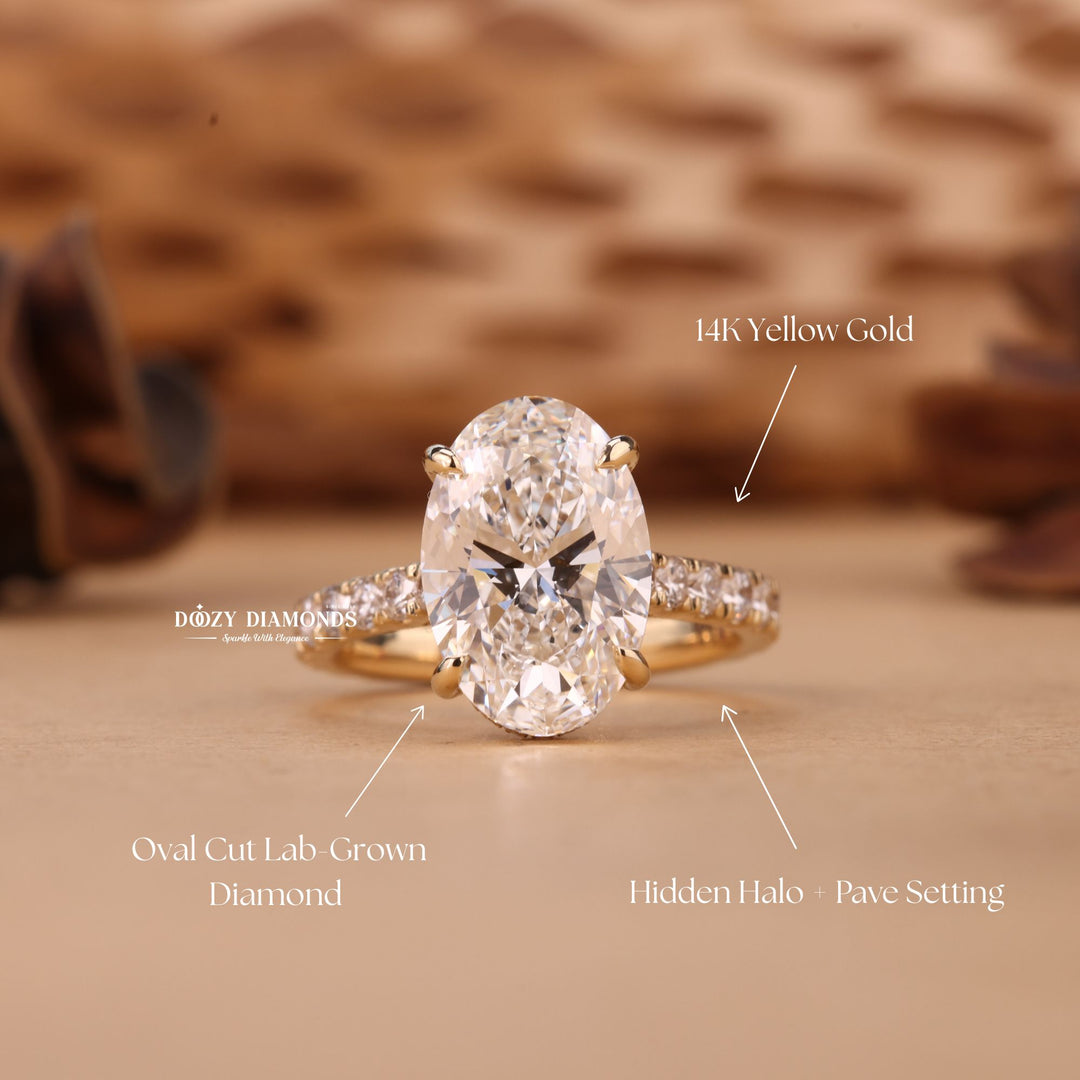 Oval cut diamond ring worn on hand