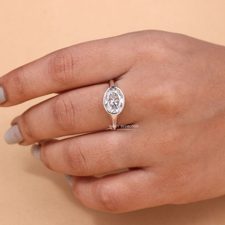 Oval east west engagement ring with certified lab grown diamond