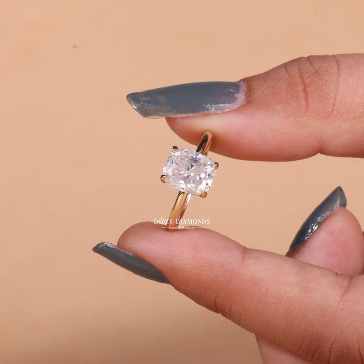 Lifestyle shot of cushion hidden halo diamond ring on hand