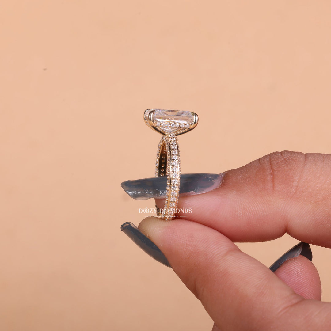 Macro shot of radiant cut diamond facets in pave ring setting