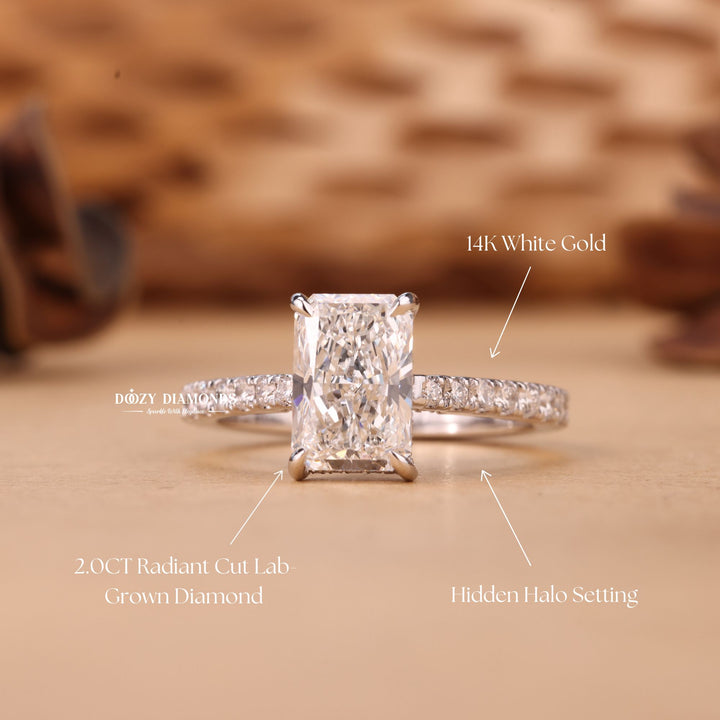 Radiant hidden halo engagement ring shown on hand for true-to-life sizing